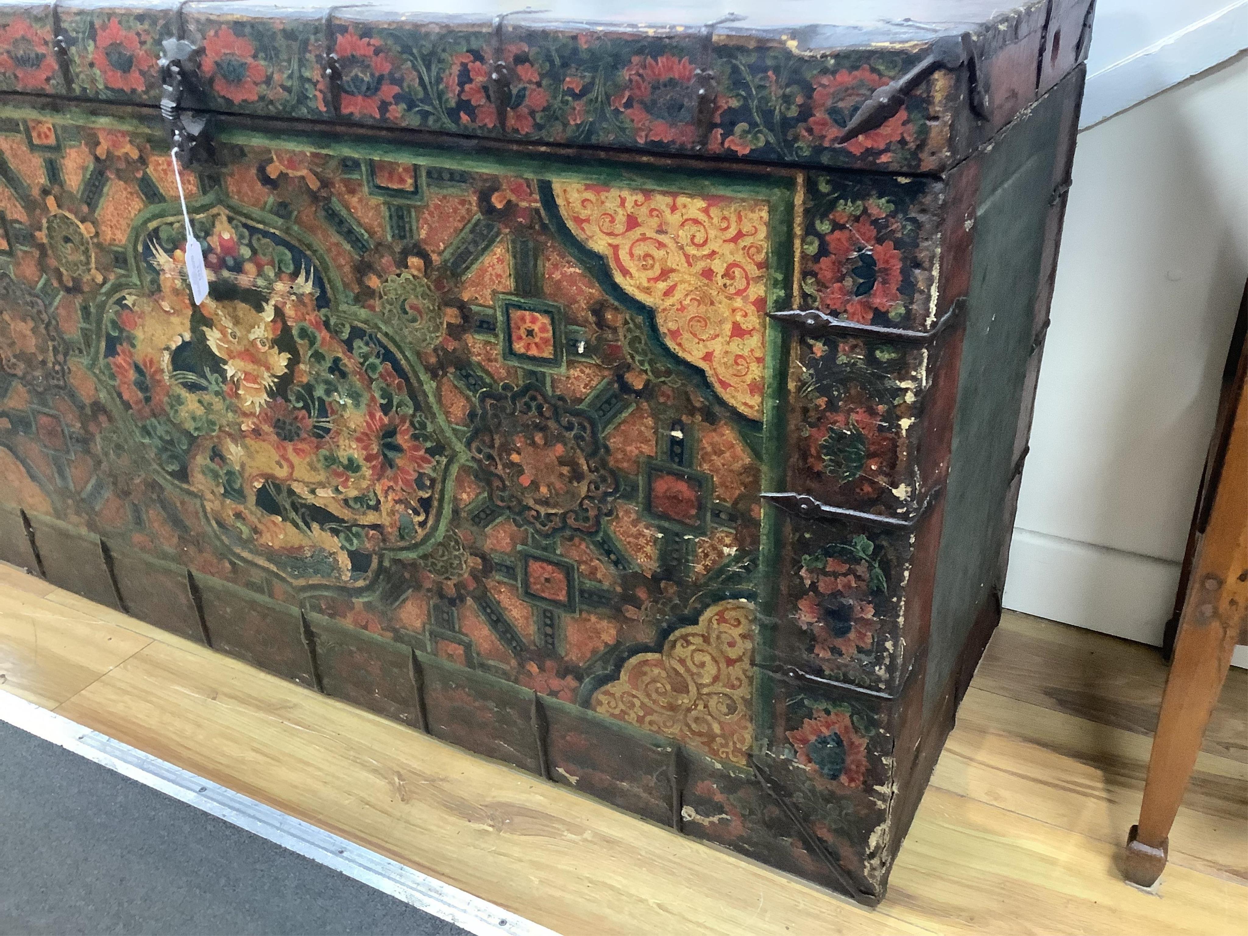 An early 19th century Tibetan, Dzongkha dragon painted trunk, width 122cm, depth 45cm, height 66cm. Condition - fair